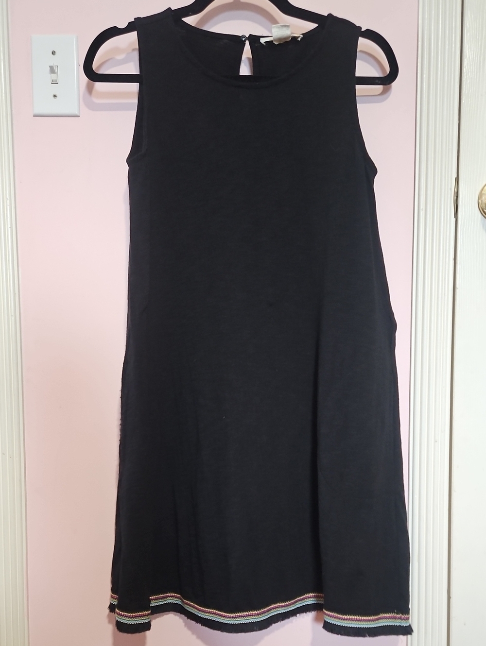Sleeveless Black A-Line Dress with Decorative Hem